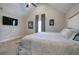Bedroom featuring vaulted ceilings, neutral paint, and a mounted television at 194 Saddleridge Dr, Bremen, GA 30110