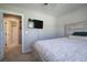 Bedroom with decorative bed and door that leads to the bathroom with a shower at 194 Saddleridge Dr, Bremen, GA 30110