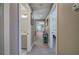 Carpeted hallway with access to a bathroom, bedroom, and living area at 194 Saddleridge Dr, Bremen, GA 30110