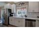 Kitchen sink area with stainless steel appliances, and white cabinetry at 194 Saddleridge Dr, Bremen, GA 30110