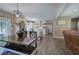 Open-concept kitchen with white cabinets, an island, and an adjacent dining area for easy entertaining at 194 Saddleridge Dr, Bremen, GA 30110