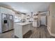 Bright kitchen with white cabinets, subway tile backsplash, stainless steel appliances, and an island at 194 Saddleridge Dr, Bremen, GA 30110
