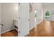 Half bathroom with a vanity and hardwood floors at 4440 Green Summers Dr, Cumming, GA 30028