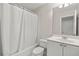 Bathroom featuring a tub/shower combo and a bright vanity with ample storage at 4440 Green Summers Dr, Cumming, GA 30028