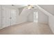 Neutral bedroom with carpet and a large closet, illuminated by a ceiling fan at 4440 Green Summers Dr, Cumming, GA 30028