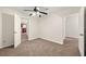 Cozy bedroom with a ceiling fan and two entrances, providing ample space and convenience at 4440 Green Summers Dr, Cumming, GA 30028