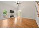 Bright living room with high ceilings, fireplace, and access to the outdoor grill at 4440 Green Summers Dr, Cumming, GA 30028