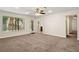 Expansive living area with lots of natural light from a large window and backyard access at 4440 Green Summers Dr, Cumming, GA 30028