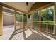 Relaxing screened porch featuring a wood ceiling and access to the backyard at 4440 Green Summers Dr, Cumming, GA 30028
