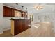 Entertainment area with wooden bar, cabinets, accent lighting, and views of the backyard at 4440 Green Summers Dr, Cumming, GA 30028
