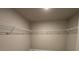 Walk in closet with lots of space and wire shelving at 338 Cherryhill Ln, Woodstock, GA 30188
