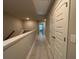 Bright hallway featuring fresh paint, new flooring, and lots of storage space at 338 Cherryhill Ln, Woodstock, GA 30188