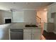 Kitchen island with stainless steel dishwasher at 338 Cherryhill Ln, Woodstock, GA 30188