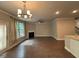 Spacious living room with fireplace and hardwood floors at 338 Cherryhill Ln, Woodstock, GA 30188