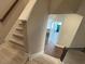 Stairway descending to a front entry way with hardwood floors at 338 Cherryhill Ln, Woodstock, GA 30188