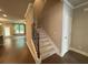 Stairway near a living room leading to the upper level at 338 Cherryhill Ln, Woodstock, GA 30188