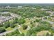 An aerial view of the neighborhood, showcasing homes and green landscapes at 3388 Hamilton Mill Rd, Buford, GA 30519