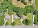 A bird's eye view of the property, highlighting its verdant surroundings and access to the road at 3388 Hamilton Mill Rd, Buford, GA 30519