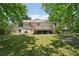 View of backyard showing the deck and covered area; lush green trees at 3388 Hamilton Mill Rd, Buford, GA 30519