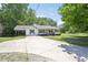 Exterior view of the home and the driveway at 3388 Hamilton Mill Rd, Buford, GA 30519