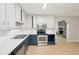 Bright kitchen offering stainless appliances, white cabinets, and an open design at 3388 Hamilton Mill Rd, Buford, GA 30519