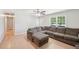 Bright living room with hardwood floors and comfortable seating at 3388 Hamilton Mill Rd, Buford, GA 30519
