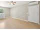 The living area boasts wood-look floors, an exterior door, and a kitchenette at 3388 Hamilton Mill Rd, Buford, GA 30519