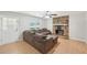Living room featuring a stone fireplace and a comfortable sectional sofa at 3388 Hamilton Mill Rd, Buford, GA 30519