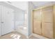 Bright bathroom featuring a bathtub, shower, and tile flooring at 360 N Oakland Circle, Mcdonough, GA 30253