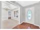 Inviting entryway featuring hardwood floors, decorative door and elegant chandelier at 360 N Oakland Circle, Mcdonough, GA 30253