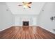 Bright living room featuring a fireplace, hardwood floors, and ample space at 360 N Oakland Circle, Mcdonough, GA 30253