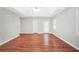 Spacious living room features hardwood floors, recessed lighting and a ceiling fan at 360 N Oakland Circle, Mcdonough, GA 30253