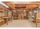 Interior view of a shed with shelving, workbenches, and an overhead light fixture at 360 N Oakland Circle, Mcdonough, GA 30253