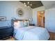 Bedroom with hardwood floors, neutral color scheme, modern decor and ensuite bathroom access at 860 Peachtree Ne St # 1613, Atlanta, GA 30308