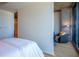 A bedroom sitting area with hardwood floors and natural light from the large window at 860 Peachtree Ne St # 1613, Atlanta, GA 30308