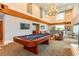 Game room with a pool table, seating area, and access to natural light at 860 Peachtree Ne St # 1613, Atlanta, GA 30308