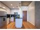 Bright kitchen with stainless steel appliances, center island, and modern design at 860 Peachtree Ne St # 1613, Atlanta, GA 30308