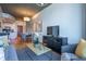 Living room featuring a dining area and views of the city skyline from large windows at 860 Peachtree Ne St # 1613, Atlanta, GA 30308