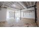 Spacious unfinished basement with white walls and concrete floors at 280 Hitchcock Rd, Dallas, GA 30157