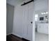 Bathroom features updated vanity and fixtures, along with a stylish barn door at 280 Hitchcock Rd, Dallas, GA 30157