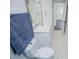 Bathroom features a vanity with white countertop, speckled tile floor, and an open doorway at 280 Hitchcock Rd, Dallas, GA 30157
