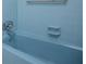 A vintage bathtub has light-blue tiling and chrome hardware at 280 Hitchcock Rd, Dallas, GA 30157