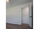 Bedroom features hardwood floors and an attached bathroom at 280 Hitchcock Rd, Dallas, GA 30157