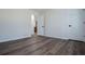 Bedroom features hardwood floors and an attached bathroom at 280 Hitchcock Rd, Dallas, GA 30157