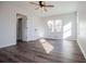 Spacious bedroom with ample natural light features new wood flooring and ceiling fan at 280 Hitchcock Rd, Dallas, GA 30157