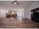 Open concept kitchen with stainless steel appliances and a fireplace adjacent at 280 Hitchcock Rd, Dallas, GA 30157
