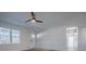 Living room with white walls, hardwood floors, and a ceiling fan at 280 Hitchcock Rd, Dallas, GA 30157