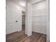 View of a large pantry closet with bi-fold doors and wire shelving at 280 Hitchcock Rd, Dallas, GA 30157