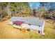 Aerial view of the home's rear exterior and deck, showcasing its private backyard and serene setting at 280 Hitchcock Rd, Dallas, GA 30157