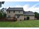Spacious backyard featuring a deck and lush green lawn at 3109 Windgate Dr, Buford, GA 30519
